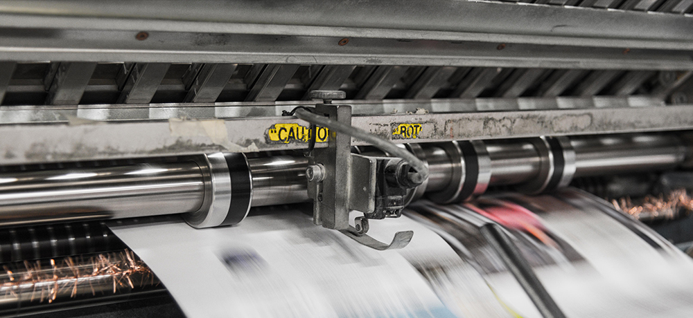 Machine working on printing services