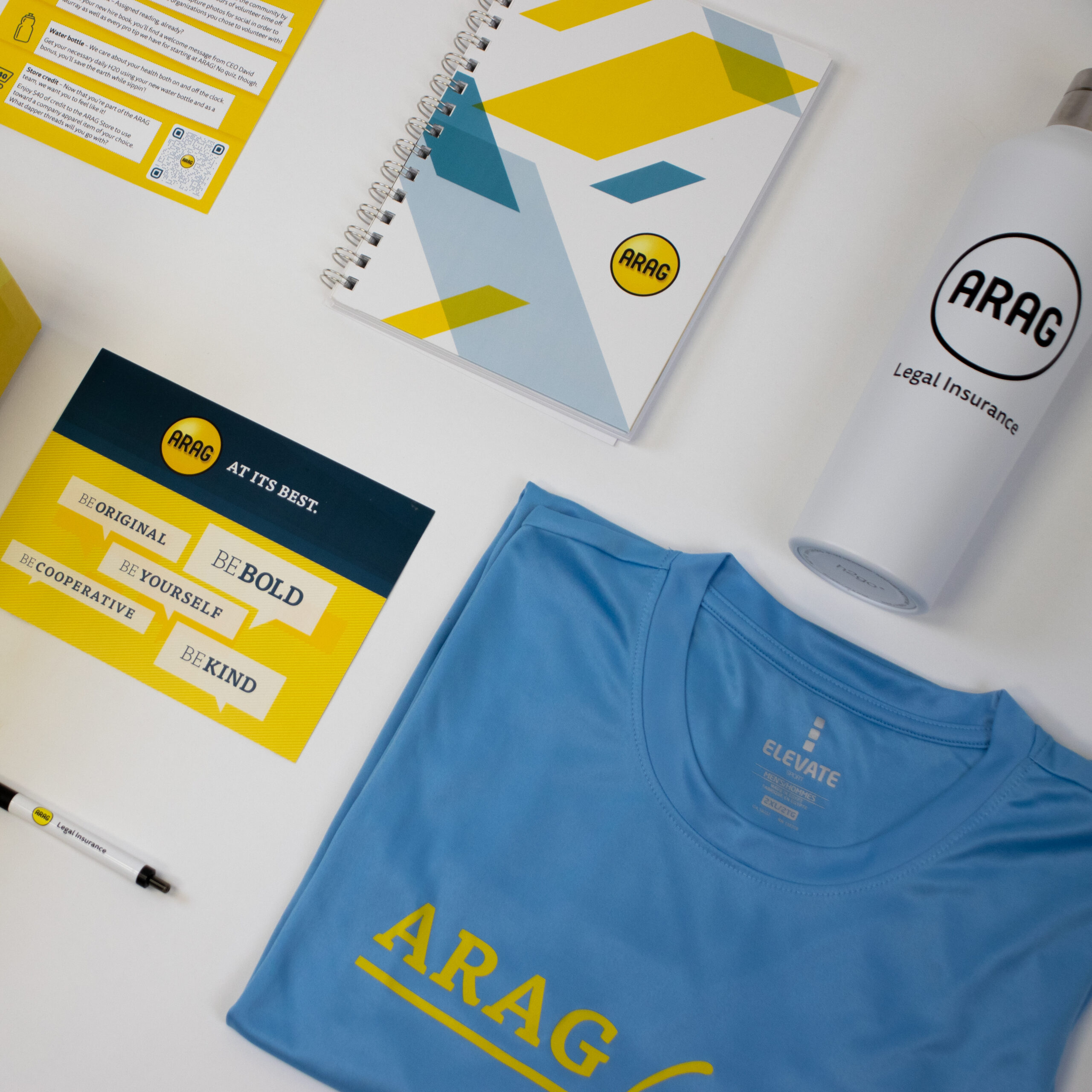 A branded T-shirt, flyer and spiral-bound booklet to be given to a hire hire at a company
