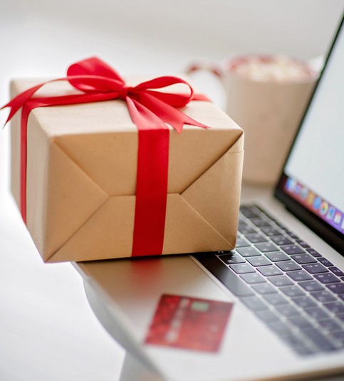 A Christmas Present sitting on a computer